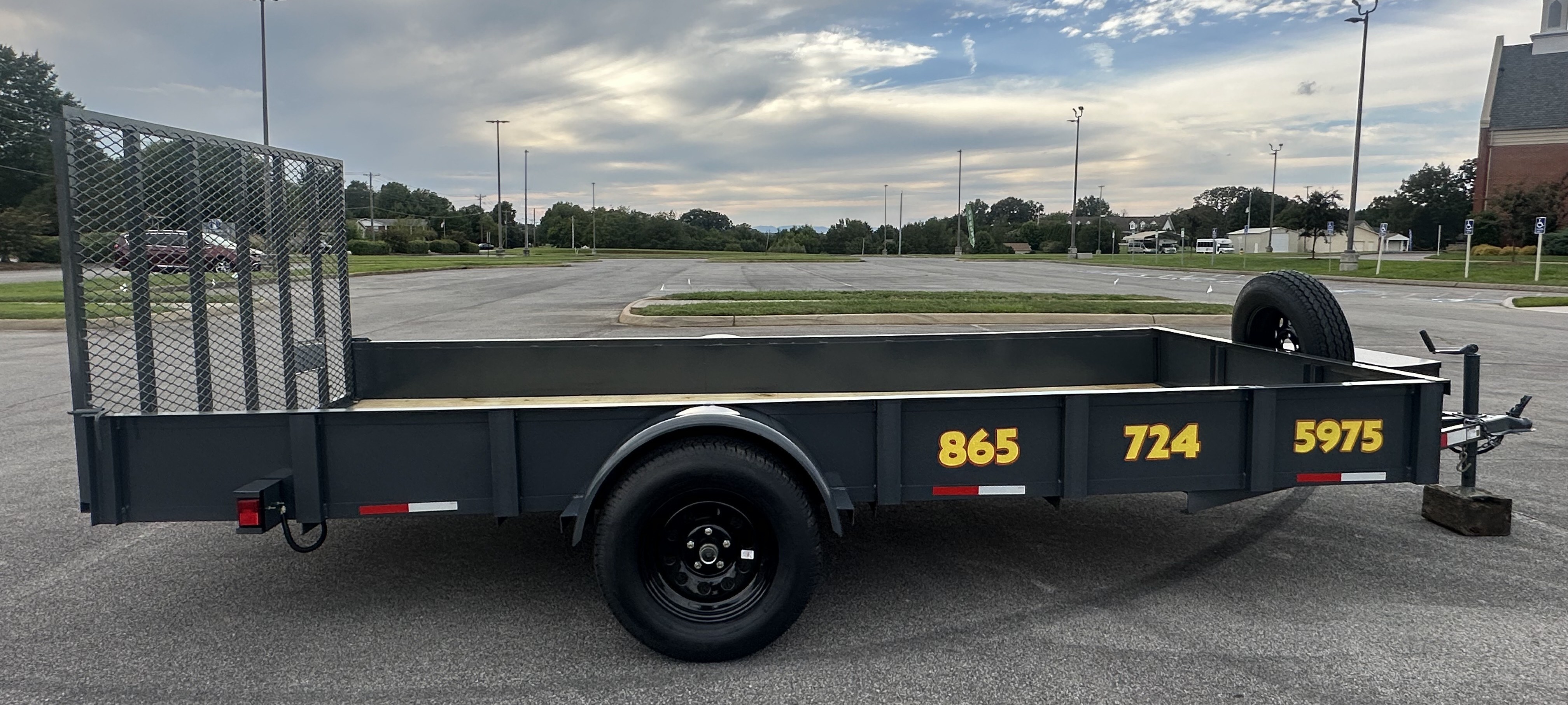 6.5x14 utility trailer with steel sides and 2500lb capacity - perfect for construction and hauling